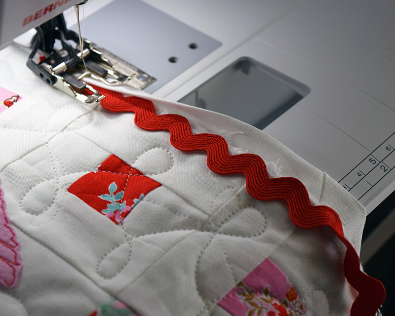 Lay Ric Rac on Quilt Front